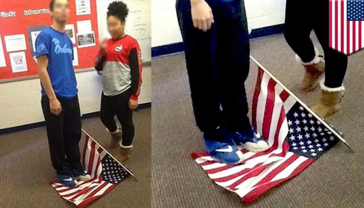 School security increased after photo of student standing on flag goes viral - TomoNews
