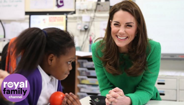 Duchess of Cambridge greeted by cute pup and shows off family photo on school tour