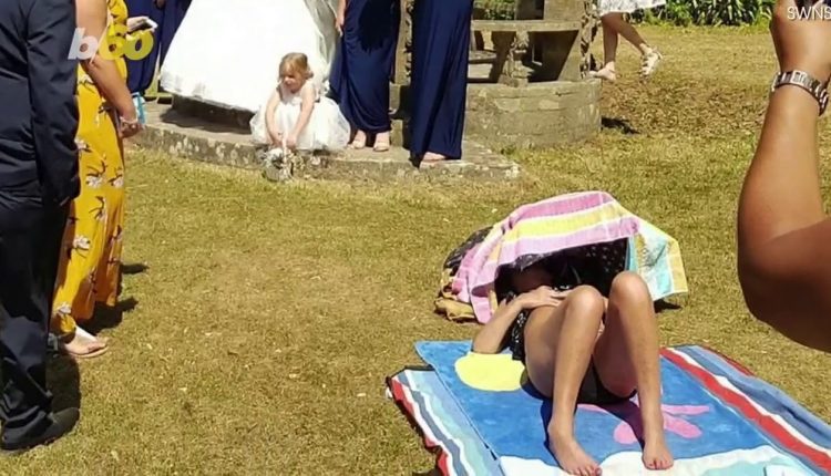 Wedding Pics Photobombed by Stubborn Bikini Clad Sunbather