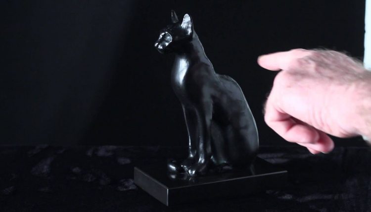 how to photograph a black subject on a black background