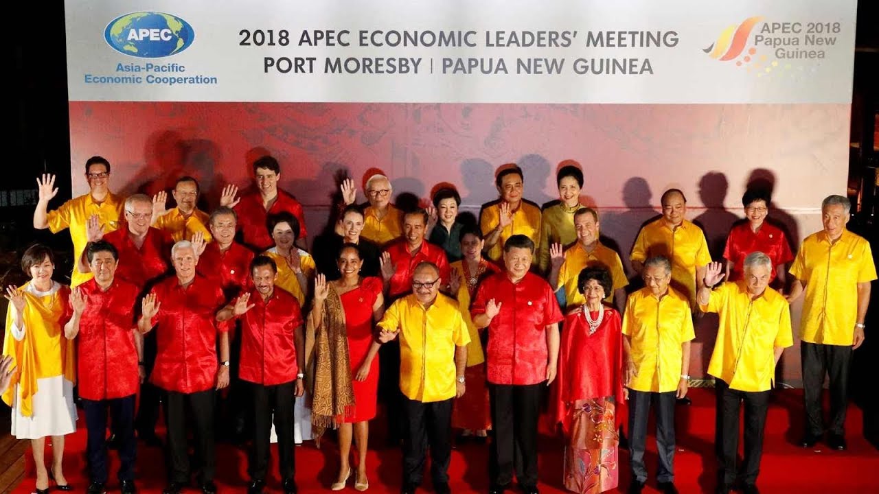 APEC leaders and their spouses pose for family photo