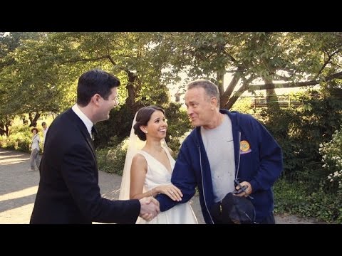 Watch This Couple's Shocked Reaction When Tom Hanks Crashes Their Wedding Photos
